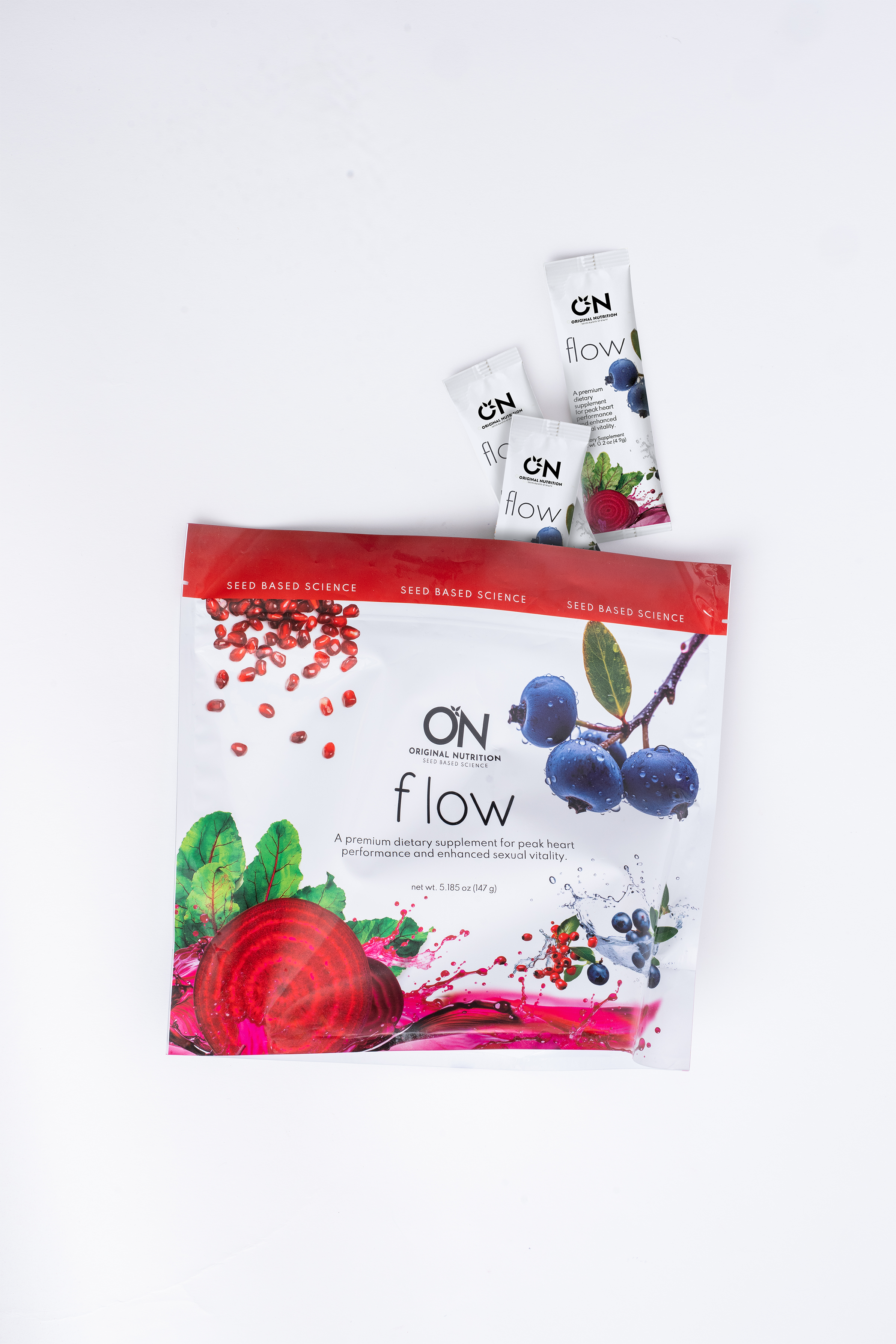 On Flow supplement packages on a white background
