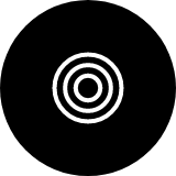 Black circle with concentric white circles in the center