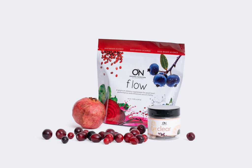Supplement package with 'On Flow' and 'On Clear' containers, surrounded by fruits and berries on a white background.