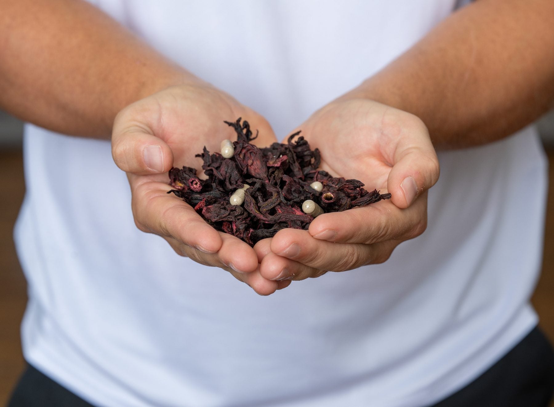 Hands holding seeds